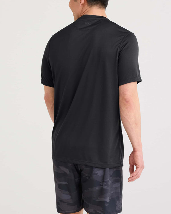 Back - Model wearing Multi-Sport Tech Tee in Faded Black