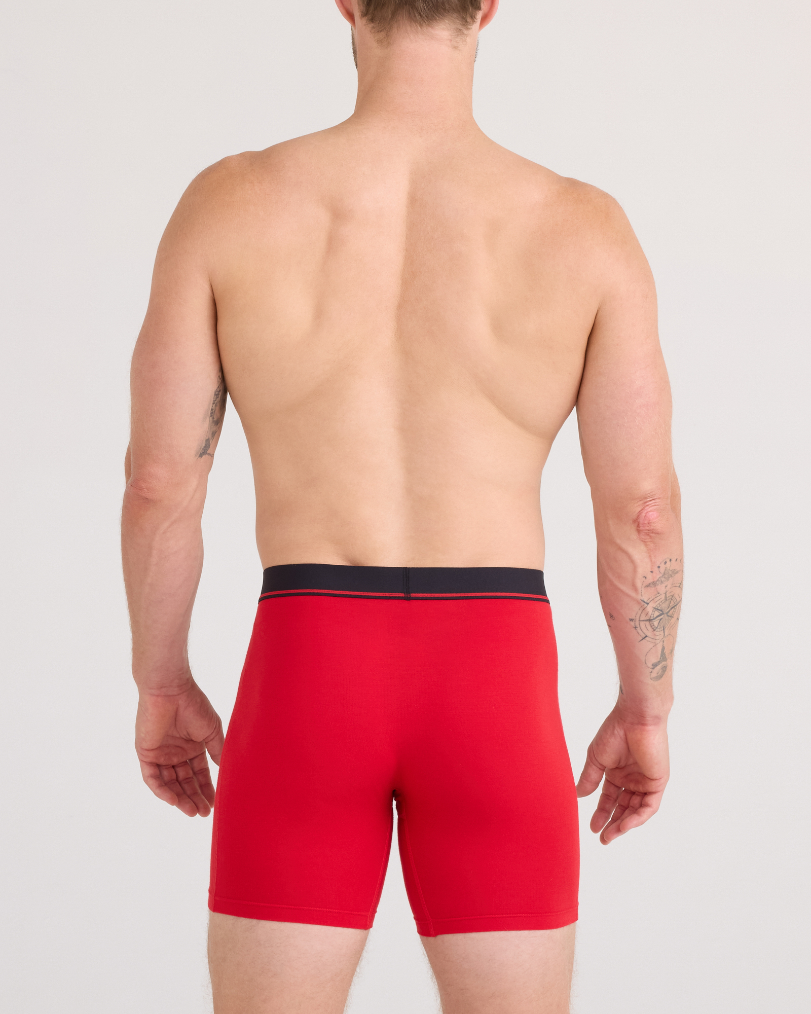 Back - Model posing in Essential Cotton Boxer Brief in Classic Red