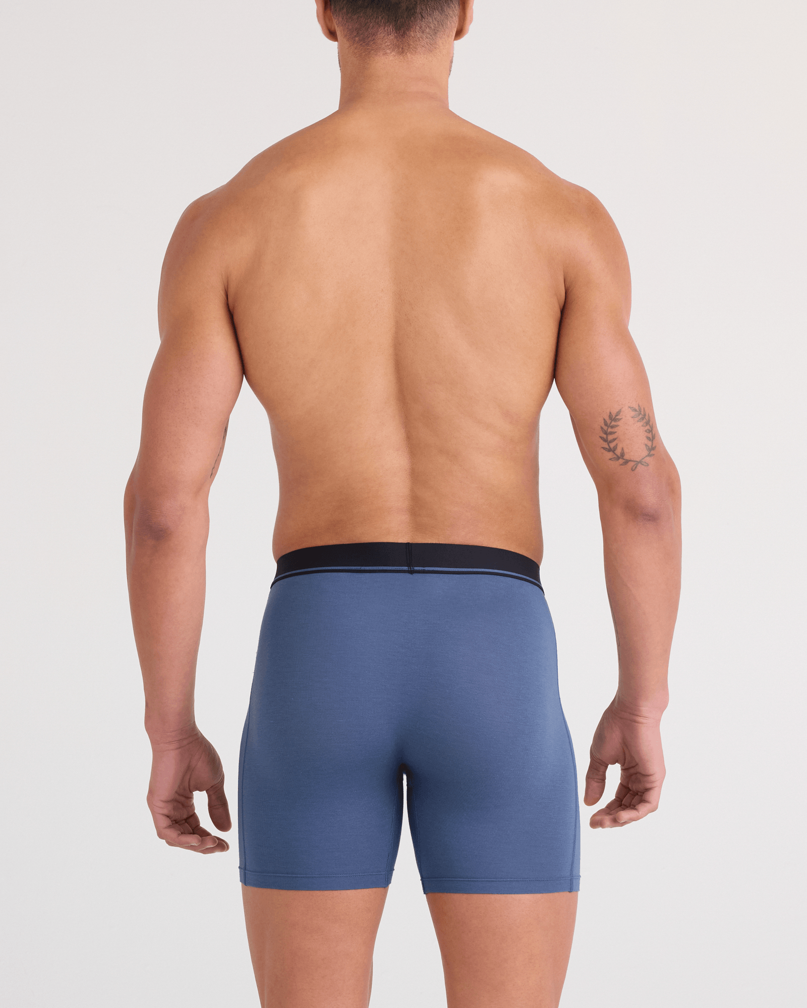 Front - Model wearing Essential Cotton Boxer Brief (3 Pack) in Tradewinds/Indigo/Maroon