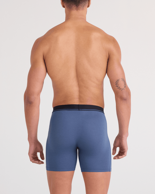 Front - Model wearing Essential Cotton Boxer Brief (3 Pack) in Tradewinds/Indigo/Maroon