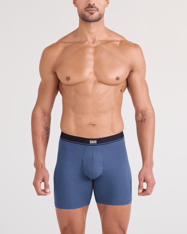 Back - Model wearing Essential Cotton Boxer Brief (3 Pack) in Tradewinds/Indigo/Maroon