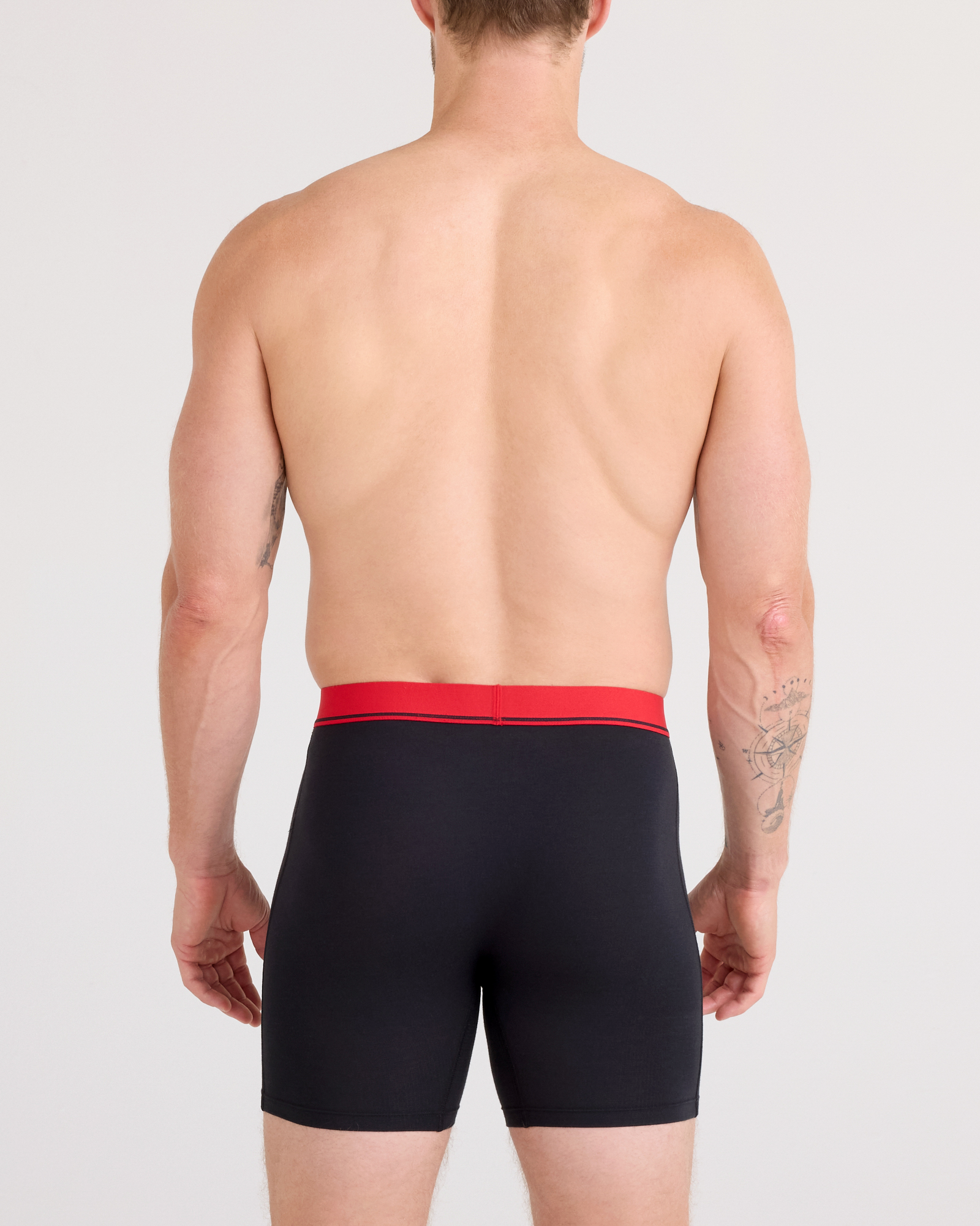 Back - Model posing in Essential Cotton Boxer Brief in Red/Navy/Turbulence Waistband