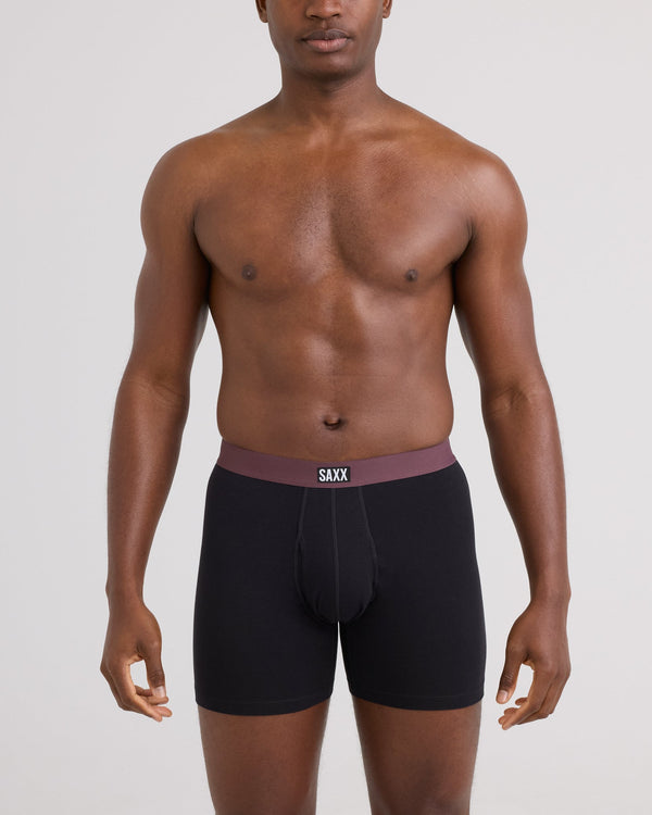 Front - Model wearing Non-Stop Stretch Cotton Boxer Brief 3 Pack in Black/Multi Waistband