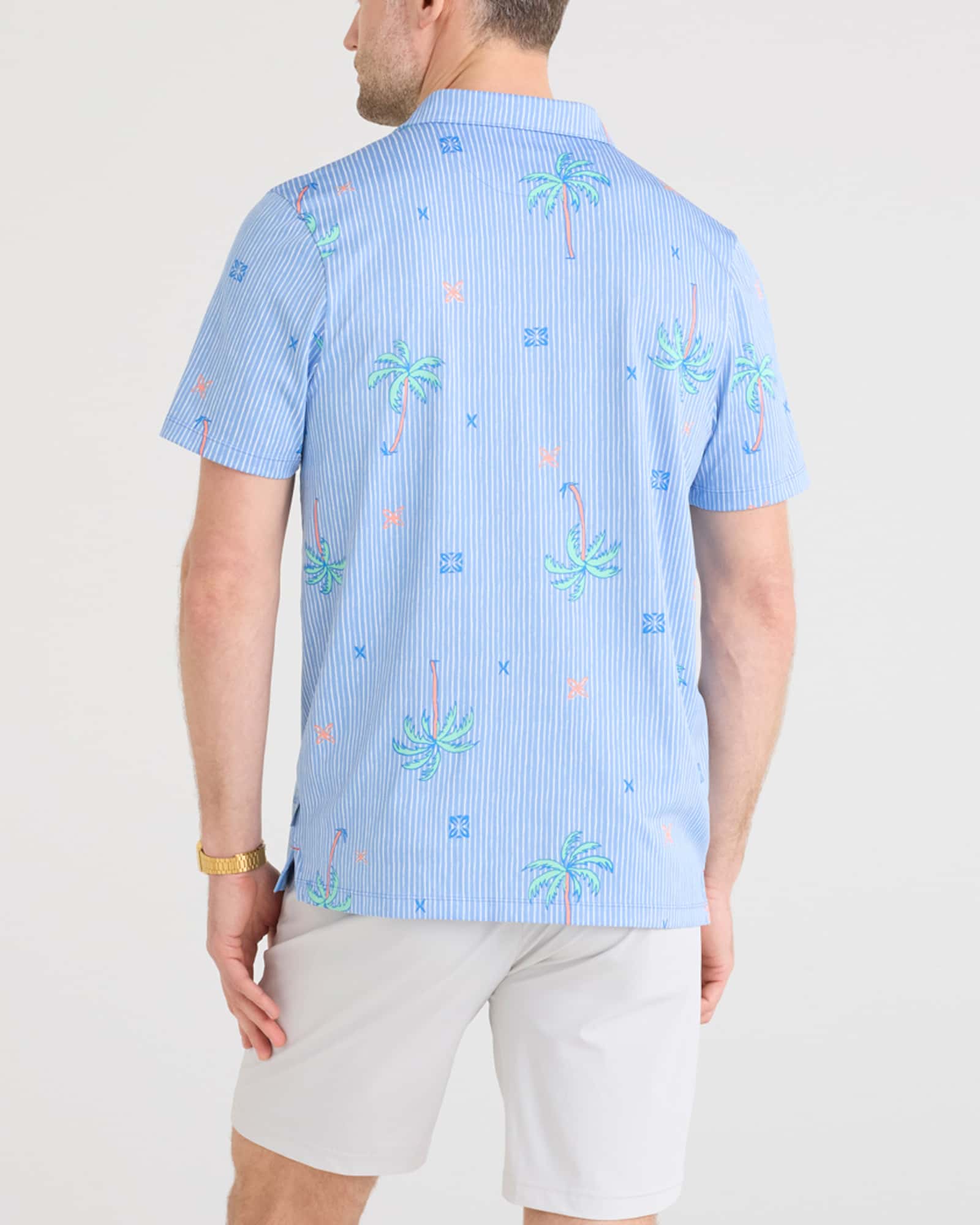 Back - Model wearing Droptemp Dry Resort Polo in Palmtastic-Bel Air Blue