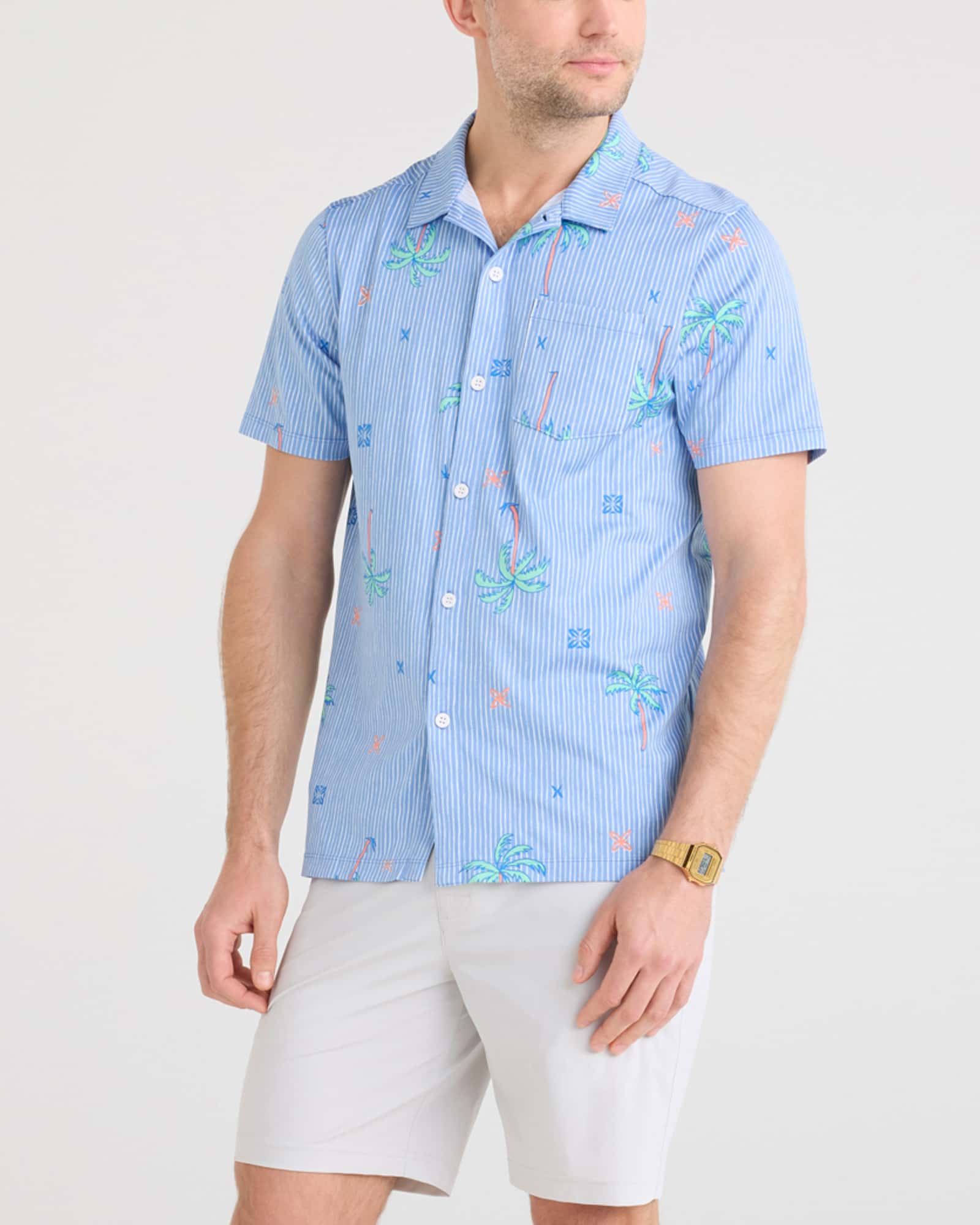 Front - Model wearing Droptemp Dry Resort Polo in Palmtastic-Bel Air Blue