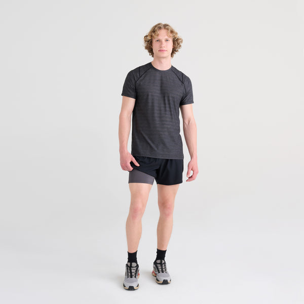 Front - Model wearing Hightail 2N1 Run Short 5" in Black showing liner