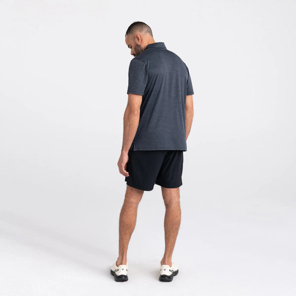 Back - Model wearing Droptemp All Day Cooling  Polo in Turbulence Heather