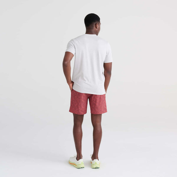 Back - Model wearing Multi-Sport 2N1 Short Regular in Palm Camo- Desert Red