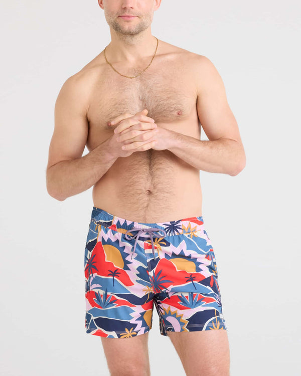 Front - Model wearing Oh Buoy 2N1 Swim Volley 5" in Break of Dawn-Blue