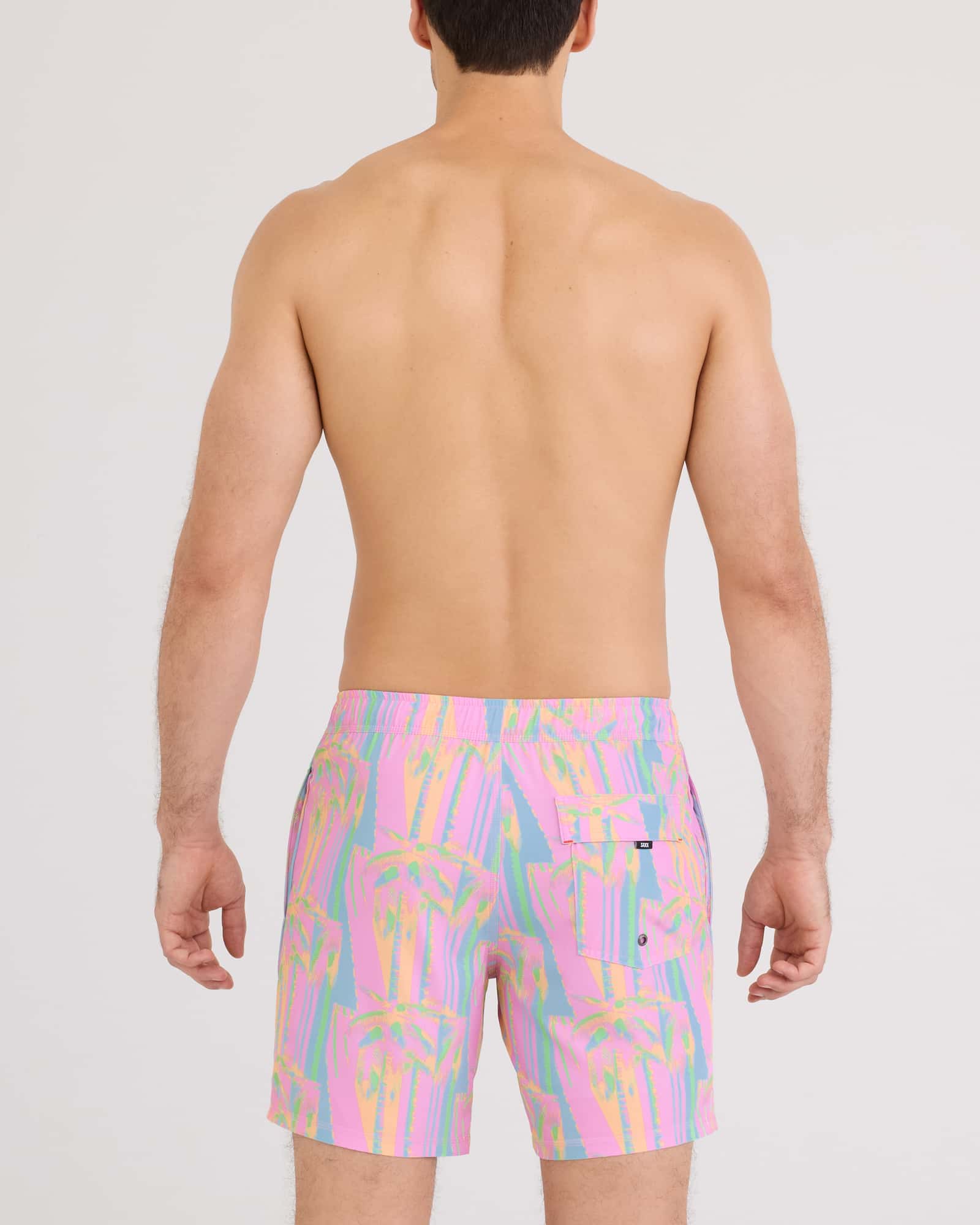 Back - Model wearing Oh Buoy 2N1 Volley 7" in Optic Tropic-Multi