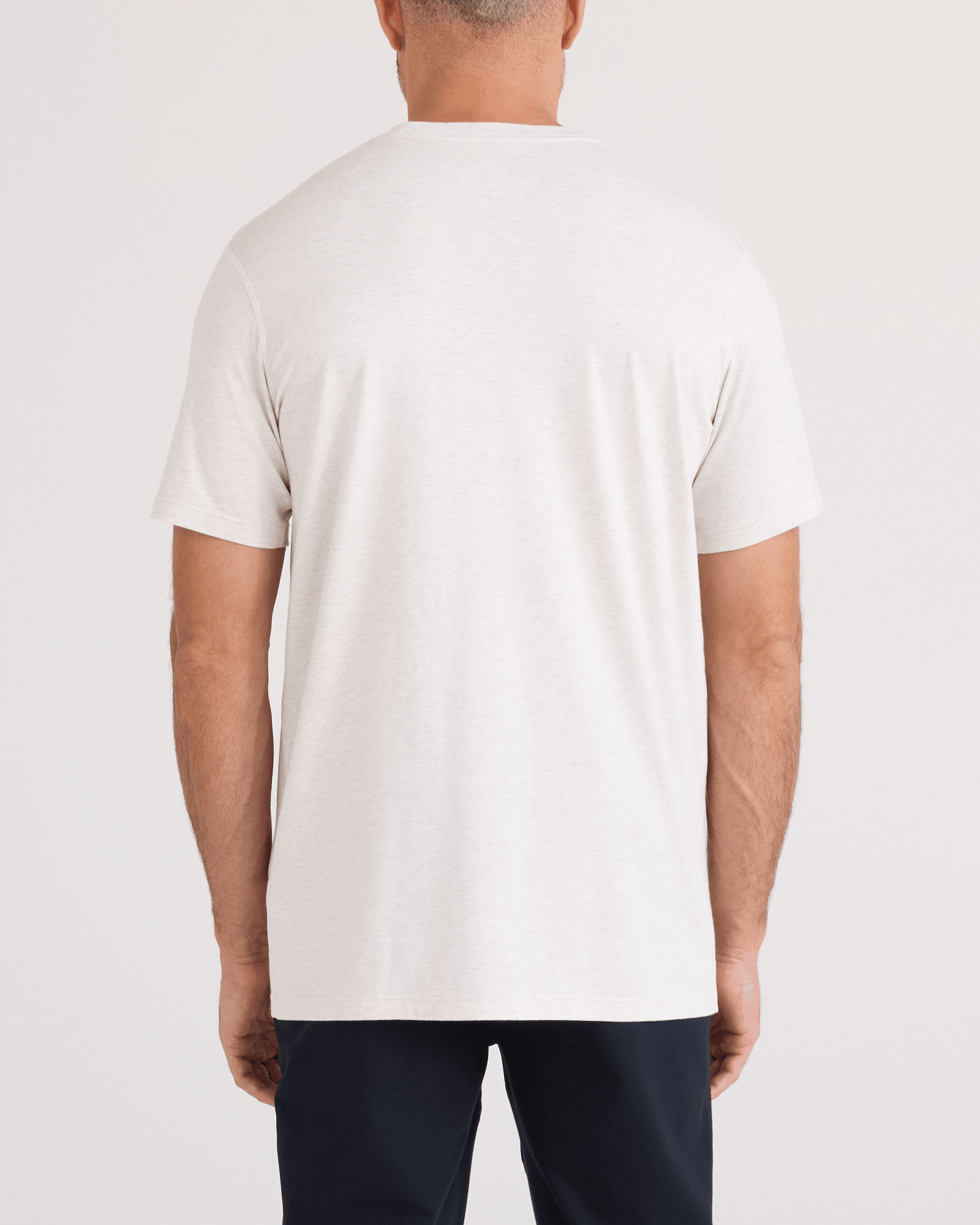 Back - Model wearing  DropTemp Cooling Cotton Tee in Steel Heather