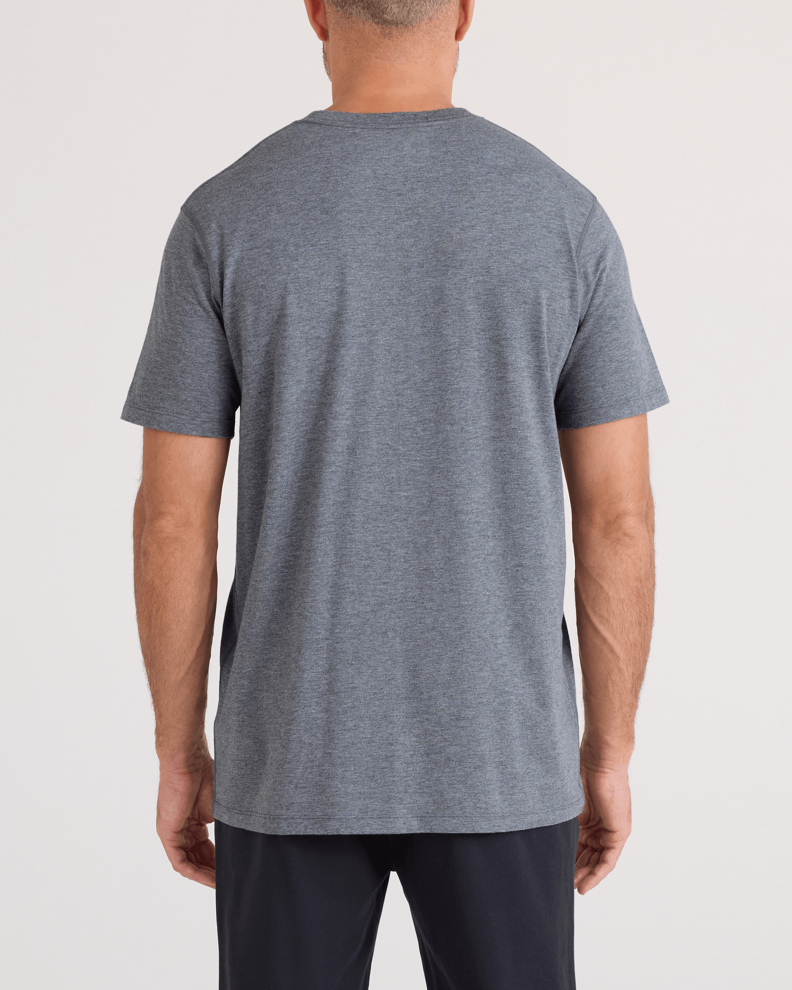 Back - Model wearing  DropTemp Cooling Cotton Tee in Turbulence Heather