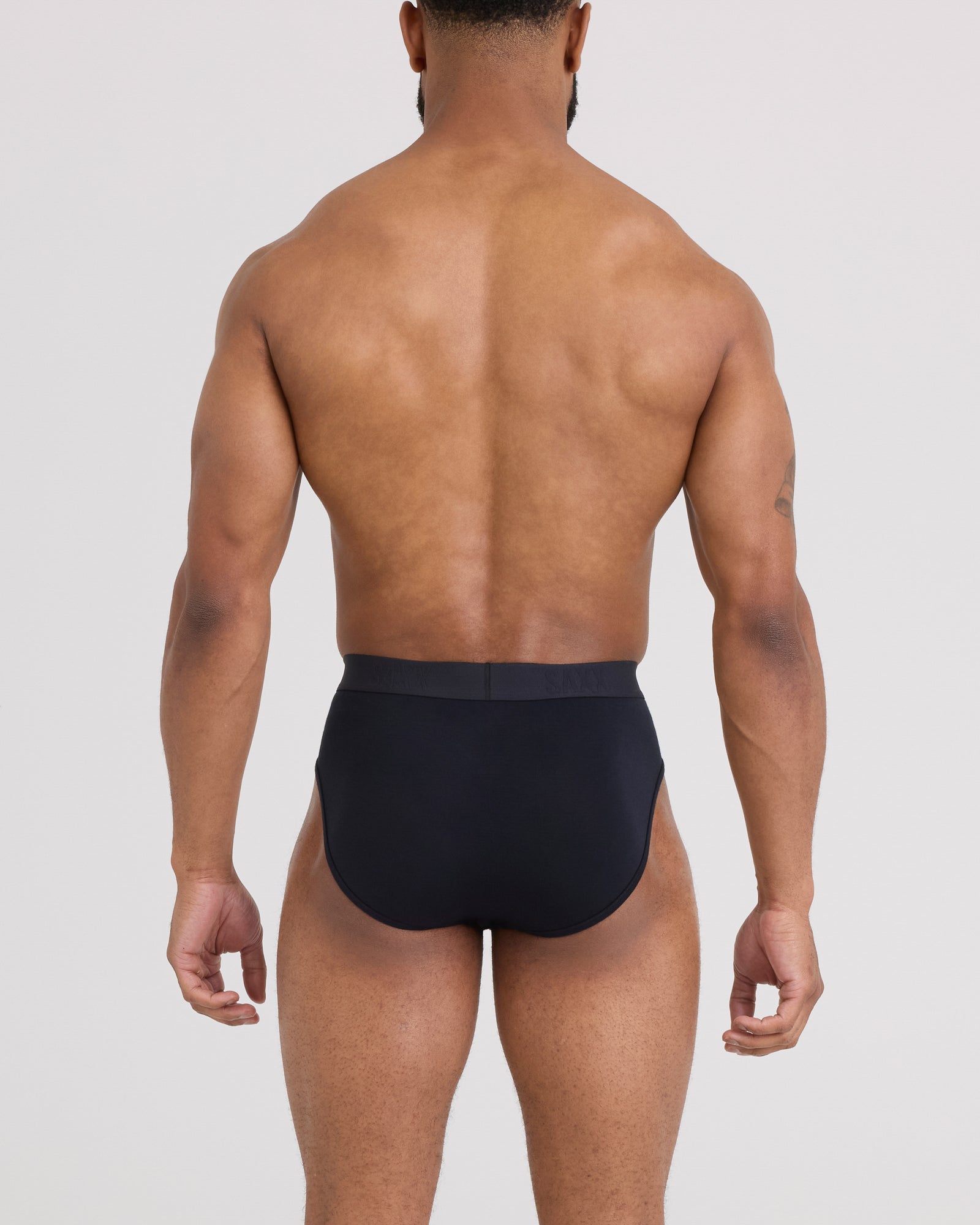 Back - Model wearing Vibe Xtra Brief in Black