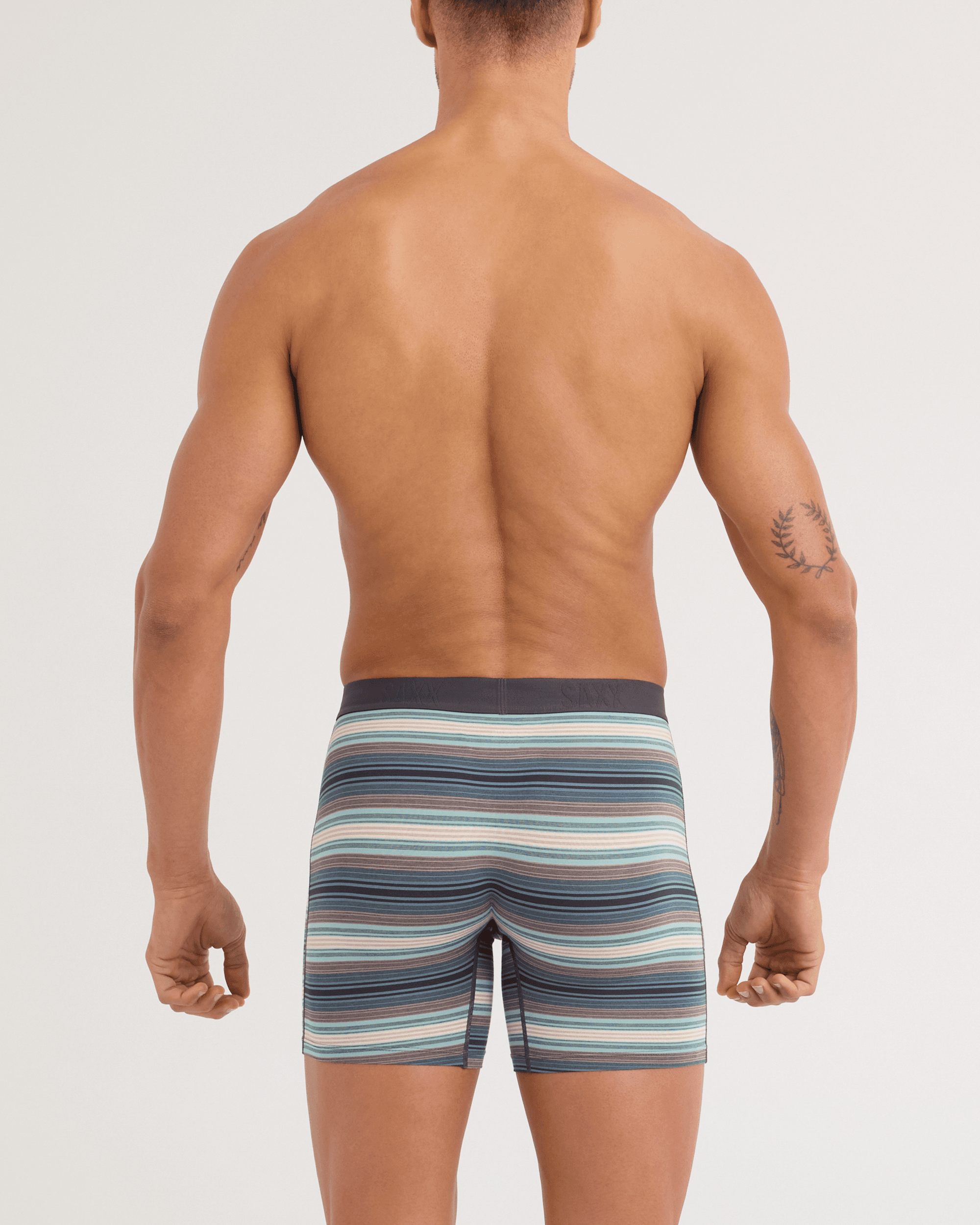 Back - Model wearing Vibe Xtra Soft Comfort Boxer Brief in Baja Stripe-Dark Sage