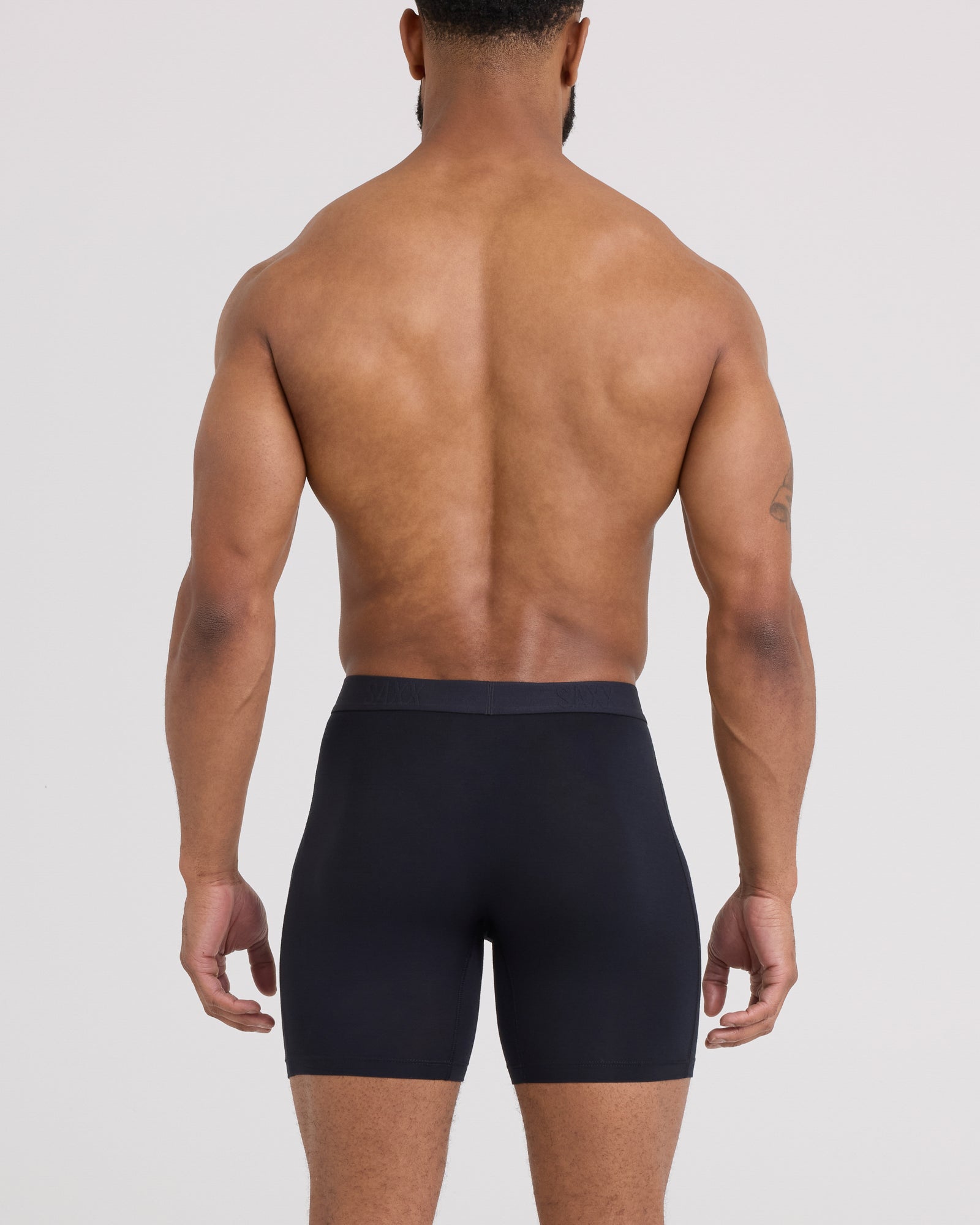 Back - Model wearing Vibe Xtra Boxer Brief Fly in Black