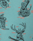 Patterned fabric with deer and snake design on a teal background