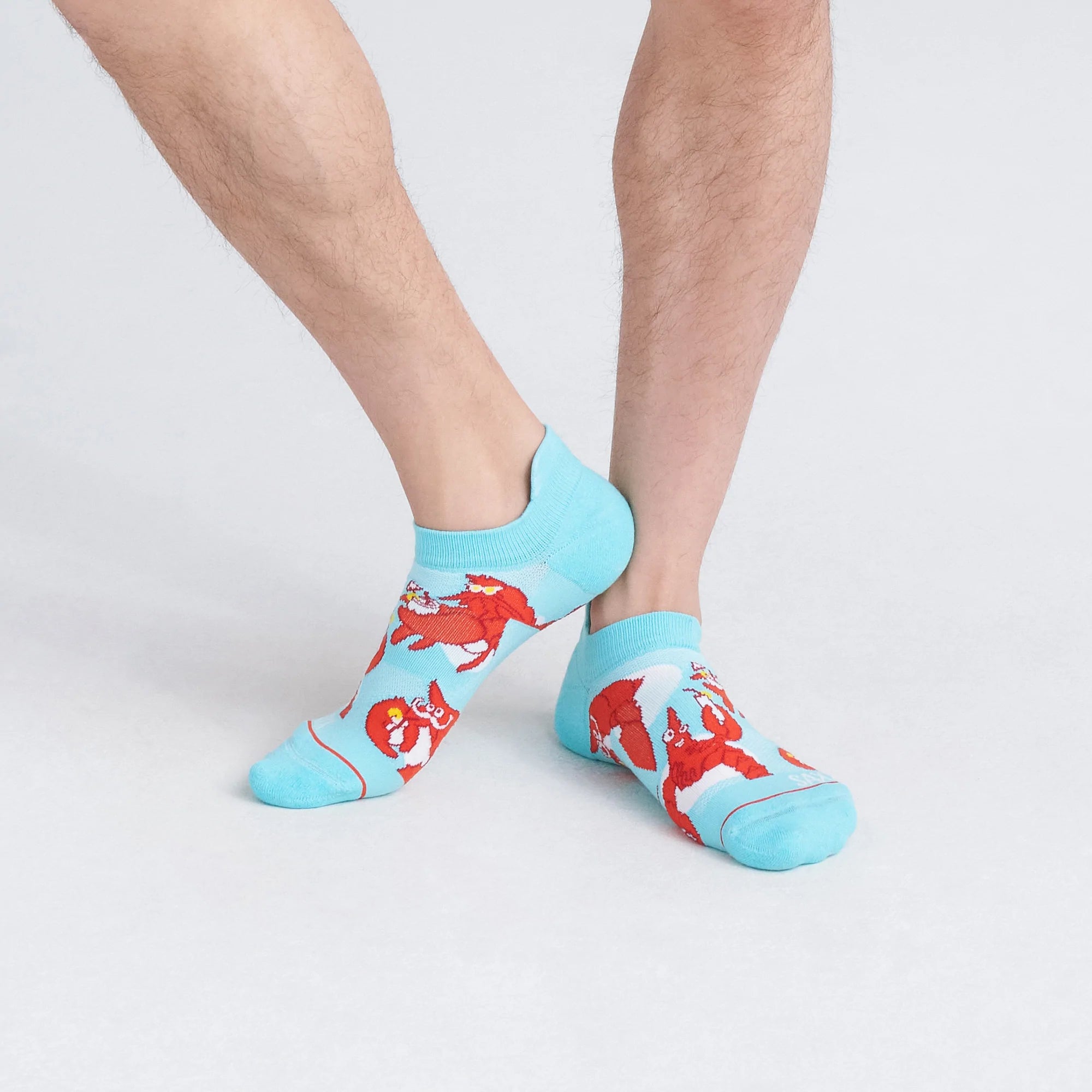 Front - Model wearing Whole Package Low Show Sock in Lobster Lounger- Aqua