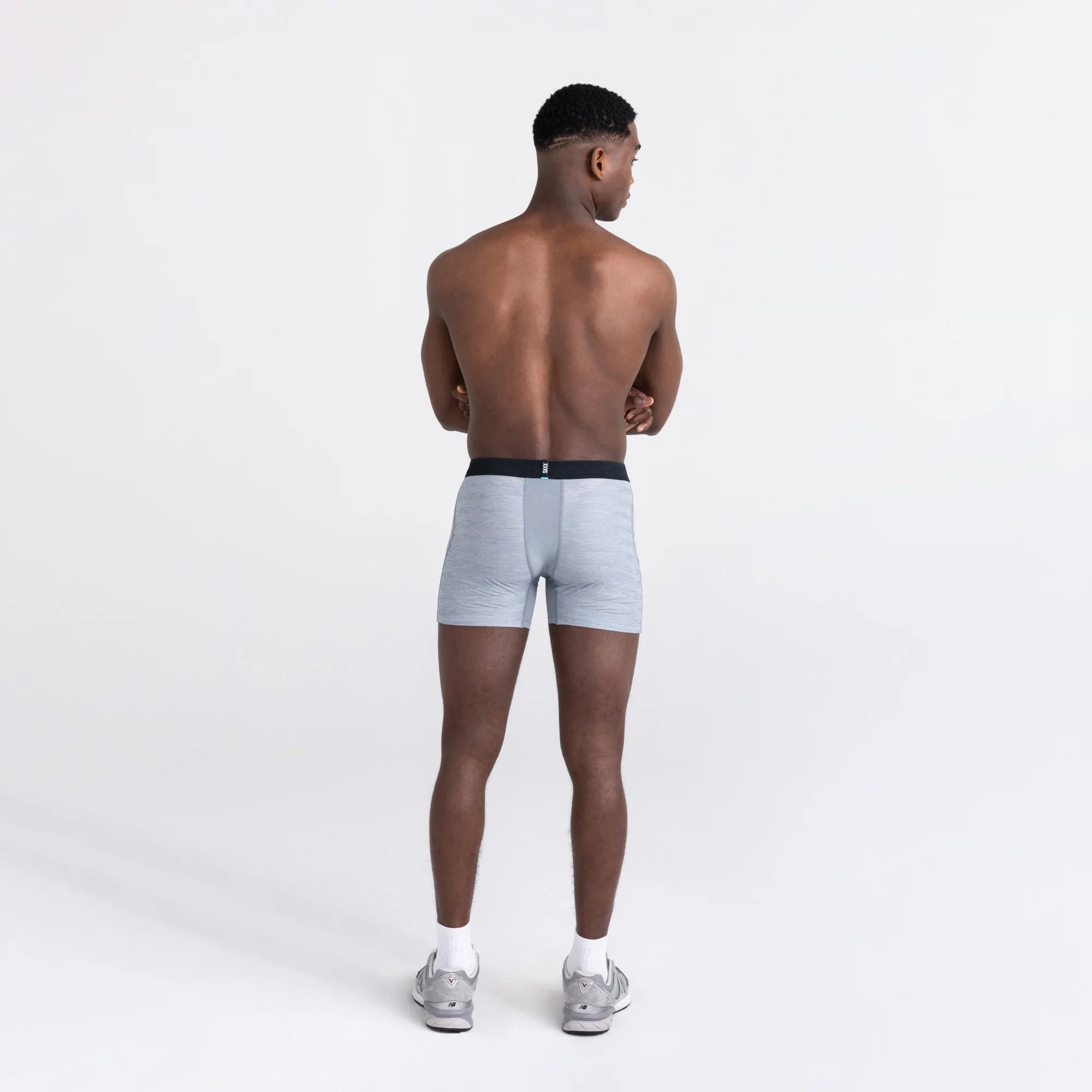 Back - Model wearing Droptemp Cooling Mesh Boxer Brief Fly in Mid Grey Heather
