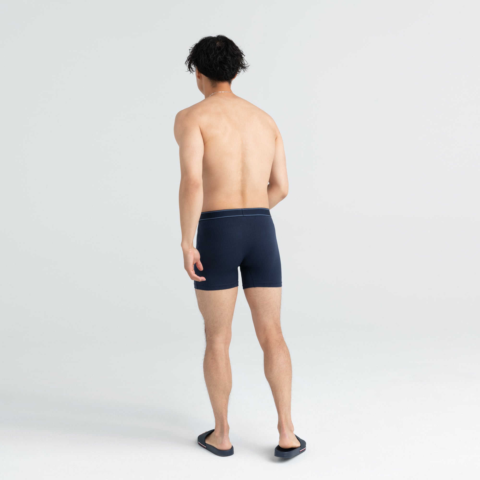 Back - Model wearing Daytripper Boxer Brief Fly 3 Pack in Navy Heather