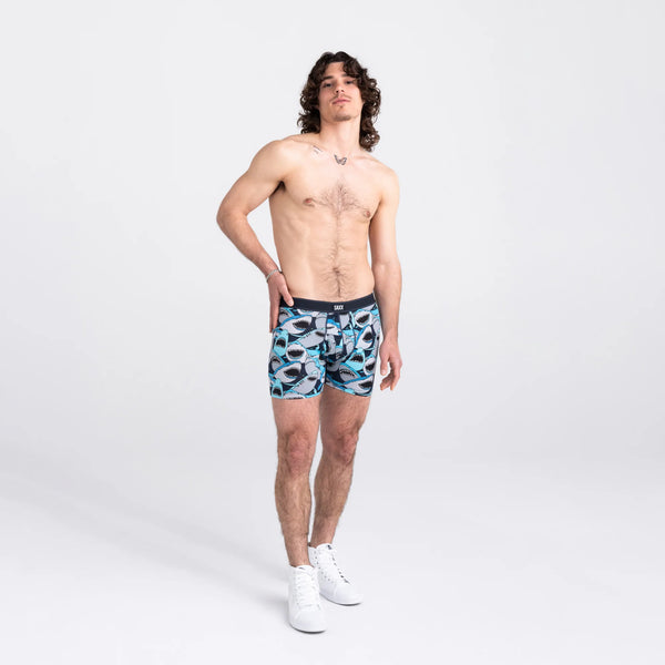 Front - Model wearing Daytripper Boxer Brief Fly in Shark Tank Camo- Navy