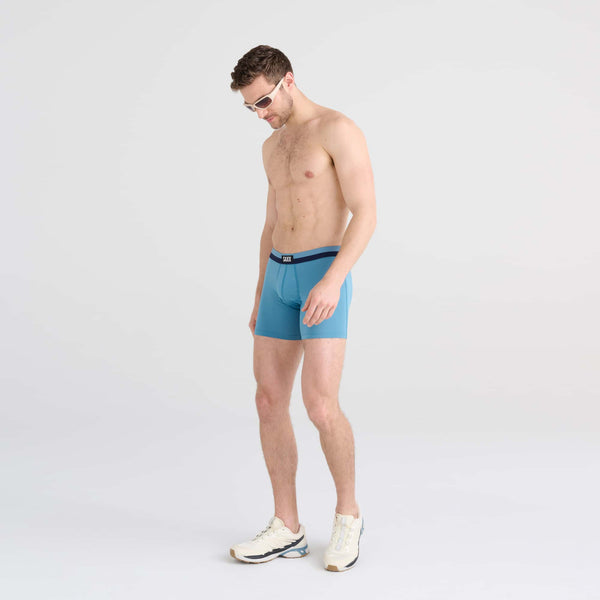 Front - Model wearing Sport Mesh Boxer Brief in Hydro Blue