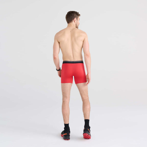 Back - Model wearing Sport Mesh Boxer Brief in Sunset Red
