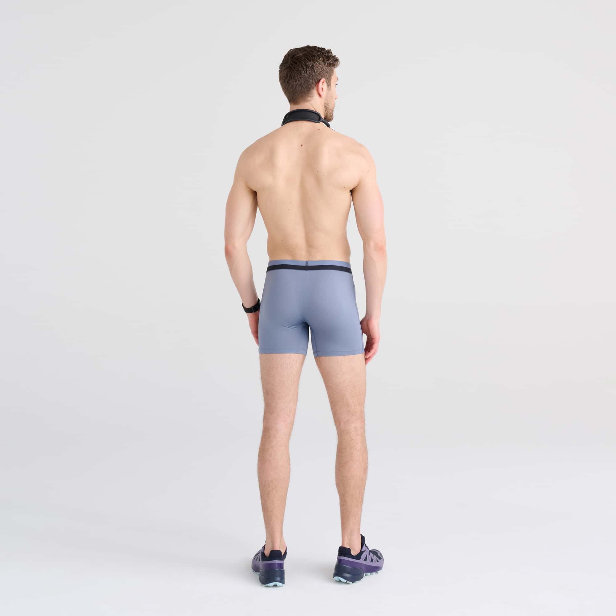 Back - Model wearing Sport Mesh Boxer Brief in Stone Blue