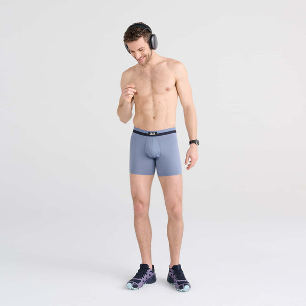 Front - Model wearing Sport Mesh Boxer Brief in Stone Blue
