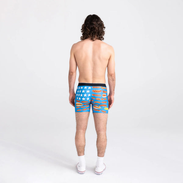 Back - Model wearing Volt Breathable Mesh Boxer Brief in All American Wieners-Blue