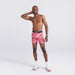 Front - Model wearing Volt Breathable Mesh Boxer Brief in Economy Candy Sweets