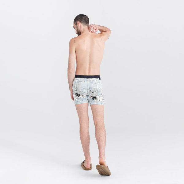 Back - Model wearing Ultra Super Soft Boxer Brief Fly in Birch- Grey