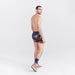 Back - Model wearing Ultra Super Soft Boxer Brief Fly in Hawaiian Pizza- Navy