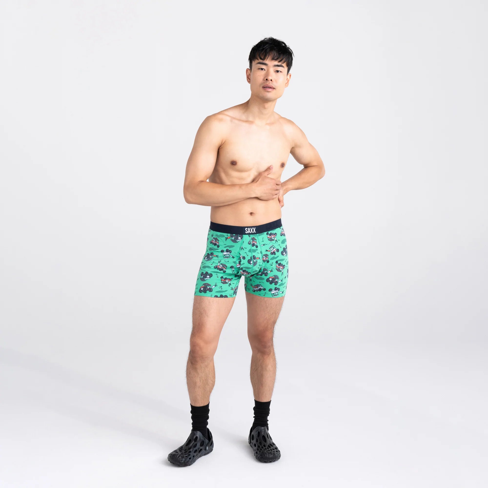 Front - Model wearing Ultra Super Soft Boxer Brief Fly in Off Course Carts- Green