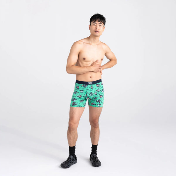 Front - Model wearing Ultra Super Soft Boxer Brief Fly in Off Course Carts- Green