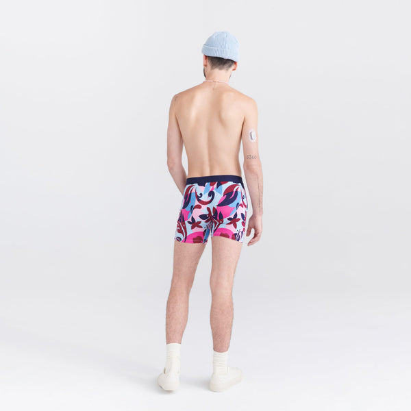 Back - Model wearing Ultra Super Soft Boxer Brief Fly in Tropical Lens- Multi