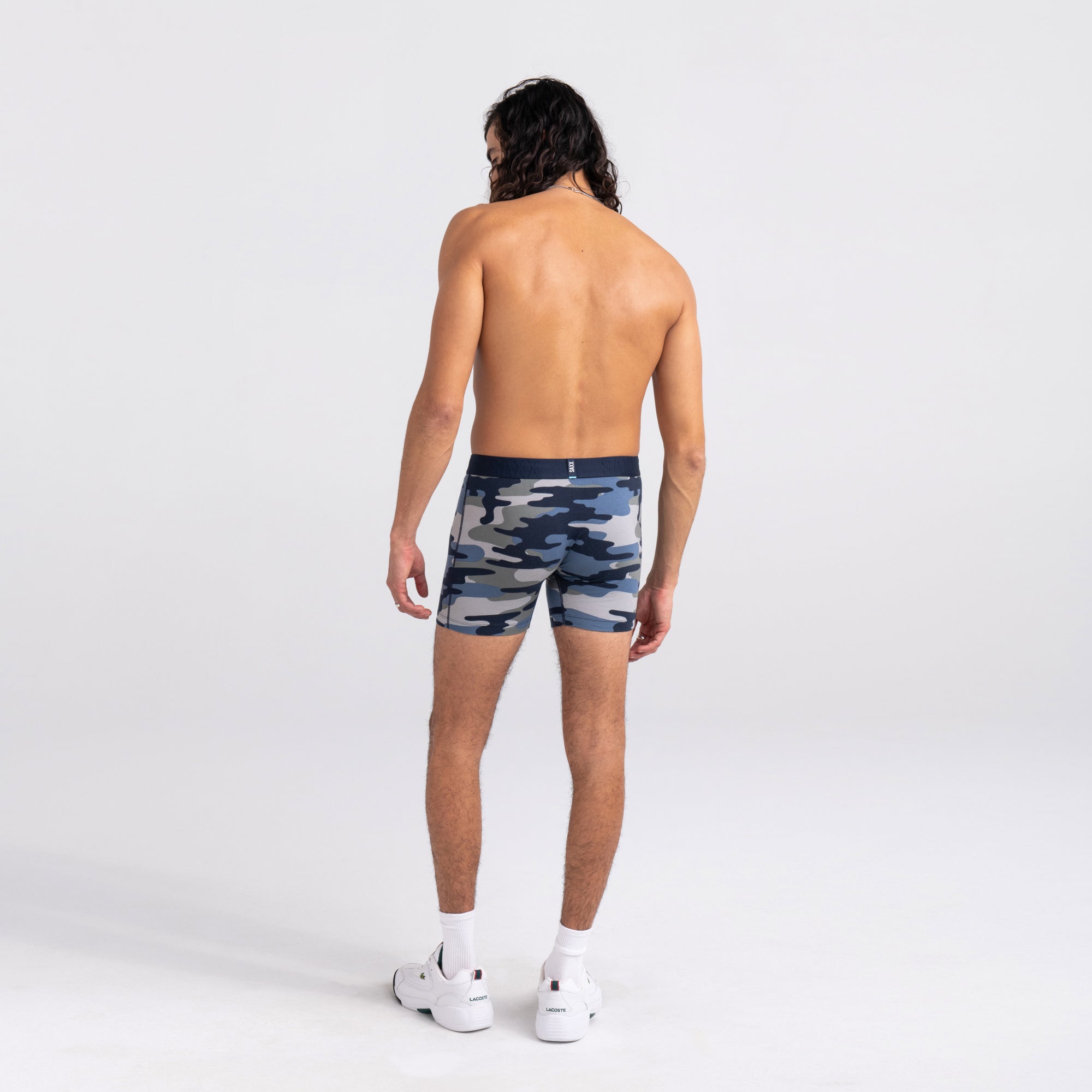 Back - Model wearing DropTemp Cooling Cotton Boxer Brief in Tidal Camo- Blue