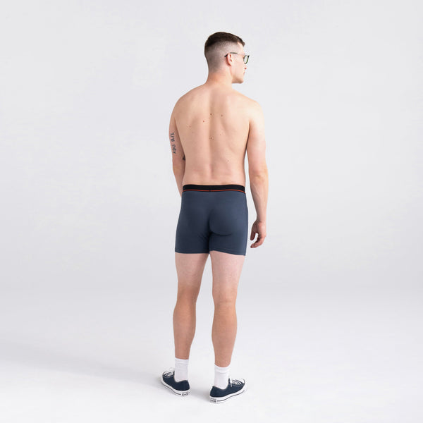 Back - Model wearing Non-Stop Stretch Cotton Boxer Brief 3-Pack in Black/Deep Navy/White