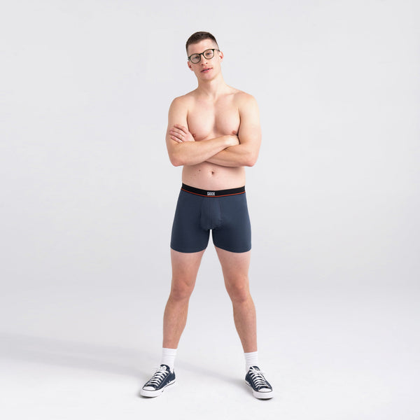 Front - Model wearing Non-Stop Stretch Cotton Boxer Brief 3-Pack in Black/Deep Navy/White