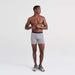 Front - Model wearing Quest Baselayer Boxer Brief in Field Stripe- Charcoal