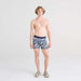 Front - Model wearing Quest Baselayer Boxer Brief in Upstream- Twilight