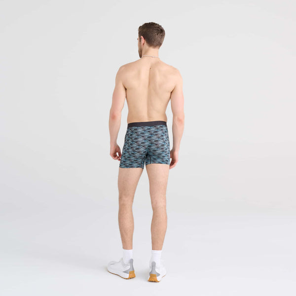 Back - Model wearing Vibe Boxer Brief in Action Spacedye- Washed Teal