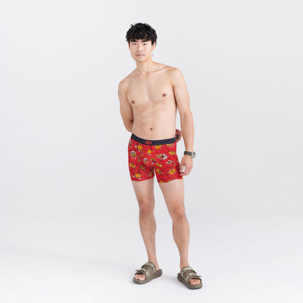 Front - Model wearing Vibe Super Soft Boxer Brief in Dumps And Noods- Red