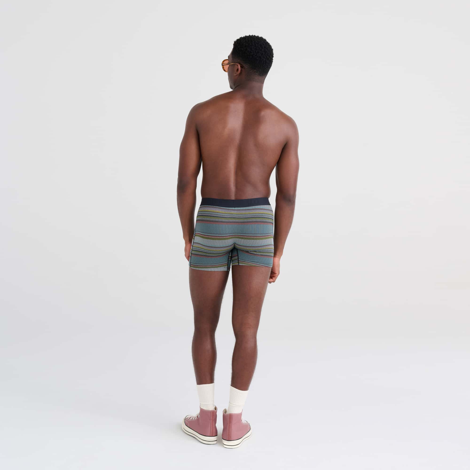 Back - Model wearing Vibe Boxer Brief in Hyperactive Stripe- Multi