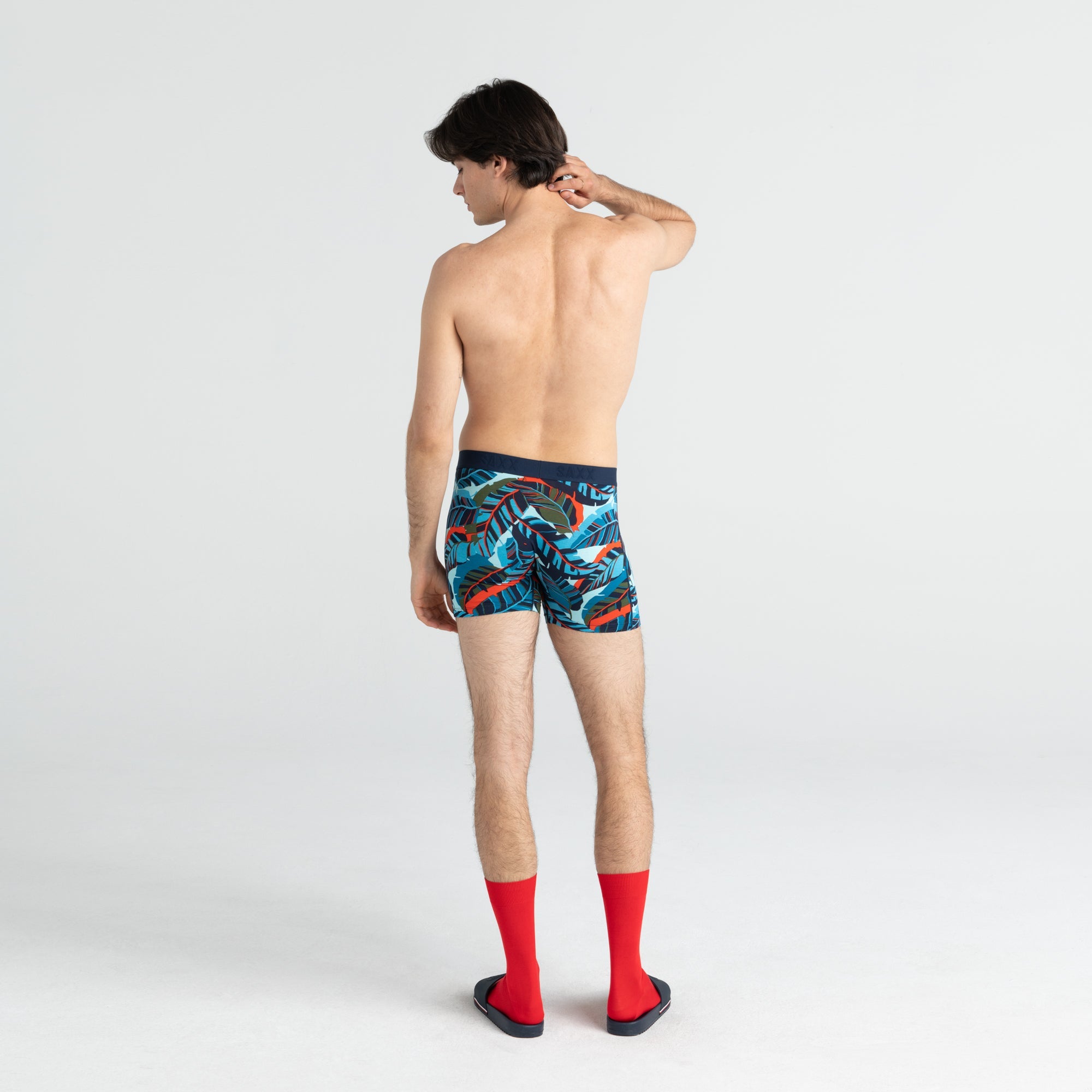 Back - Model wearing Vibe Boxer Brief in Blue Pop Jungle