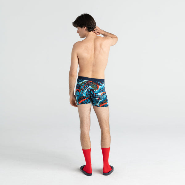 Back - Model wearing Vibe Boxer Brief in Blue Pop Jungle