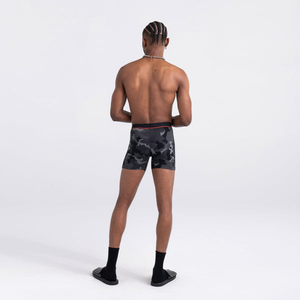 Back - Model wearing Vibe Super Soft Boxer Brief in Supersize Camo- Black