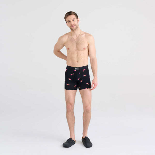 Front - Model wearing Vibe Boxer Brief in Sunset Waves- Black