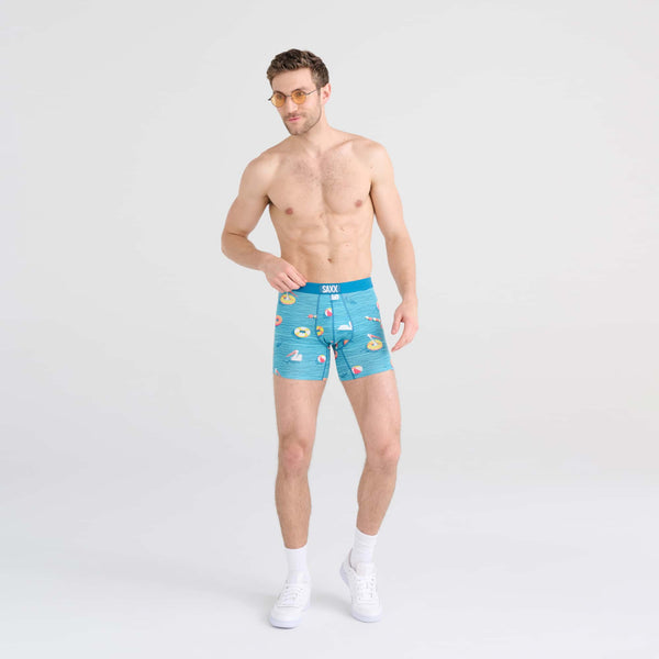Front - Model wearing Vibe Boxer Brief in Swimmers- Sea Level
