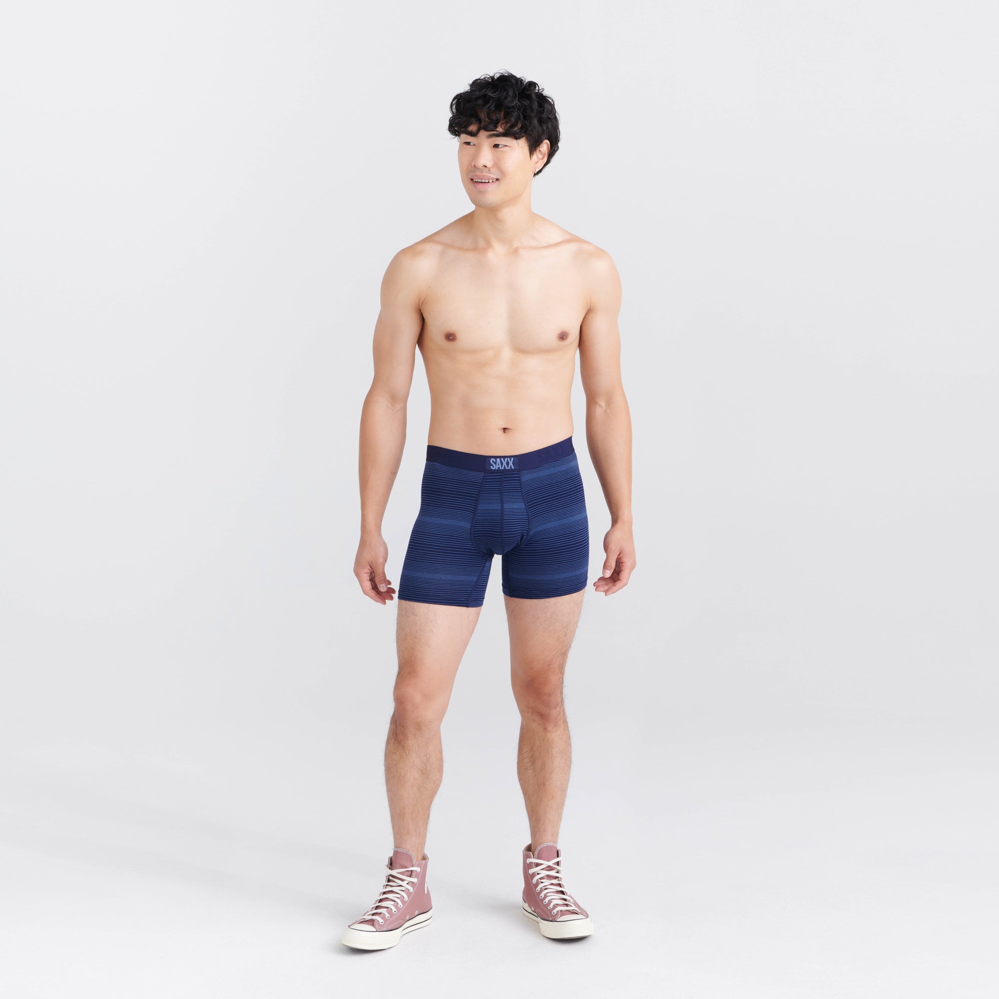 Front - Model wearing Vibe Super Soft Boxer Brief in Variegated Stripe- Maritme