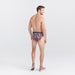 Back - Model wearing Droptemp Cooling Cotton Brief Fly in No Tell Motel- Graphite